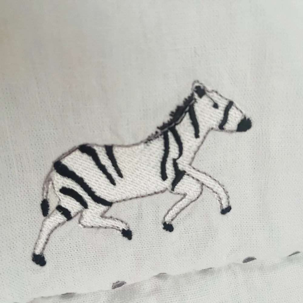 Lambs & Ivy Toddler linen blend safari quilt
